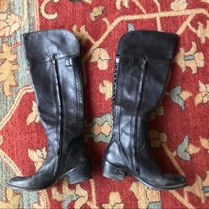 Studded black leather boots